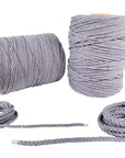 Assorted sizes of Ravenox Pearl Grey three-strand cotton macrame cords, including 3MM, 5MM, 6MM, and 9.5MM, displayed to showcase the varying thicknesses and the cord's smooth, subtle hue. (8358473957613)