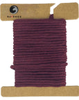 Ravenox Burgundy Macrame Cord spool with 2mm & 3mm options, elegantly displayed on a cardboard disk to highlight the deep, rich color and soft texture. (8357472567533)