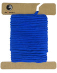 Rich Royal Blue Ravenox Macrame Cord, available in 2mm & 3mm strands, showcased on a cardboard disk highlighting the cord's regal color and texture. (8357477089517)