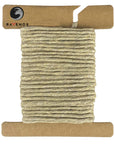 Swatch display of Ravenox 2mm & 3mm Single Strand Cotton Macrame Cord in Tan, neatly arranged on a cardboard disk, exemplifying the cord's neutral shade. (8357477187821)