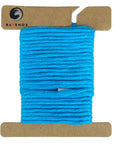 Swatch image of Ravenox 2mm & 3mm Single Strand Cotton Macrame Cord in vivid Turquoise, wrapped on a cardboard disk to display the cord's quality and color. (8357477417197)