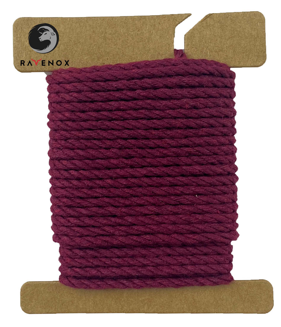 Deep Burgundy Ravenox Three Strand Twisted Cotton Cord, offered in 1/8-inch and 3/16-inch gauges, wound on a cardboard disk, showcasing the cord's sophisticated color. (3847001409)
