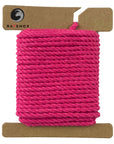 Charming Pink Ravenox Three Strand Twisted Cotton Cord in 1/8-inch and 3/16-inch sizes, neatly showcased on a cardboard disk, revealing the cord’s soft, playful hue. (3712562305)