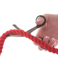 Black handled Ravenox EMT Scissors preparing to cut through a 1/2 inch Red Twisted Cotton Rope. (4297616705)