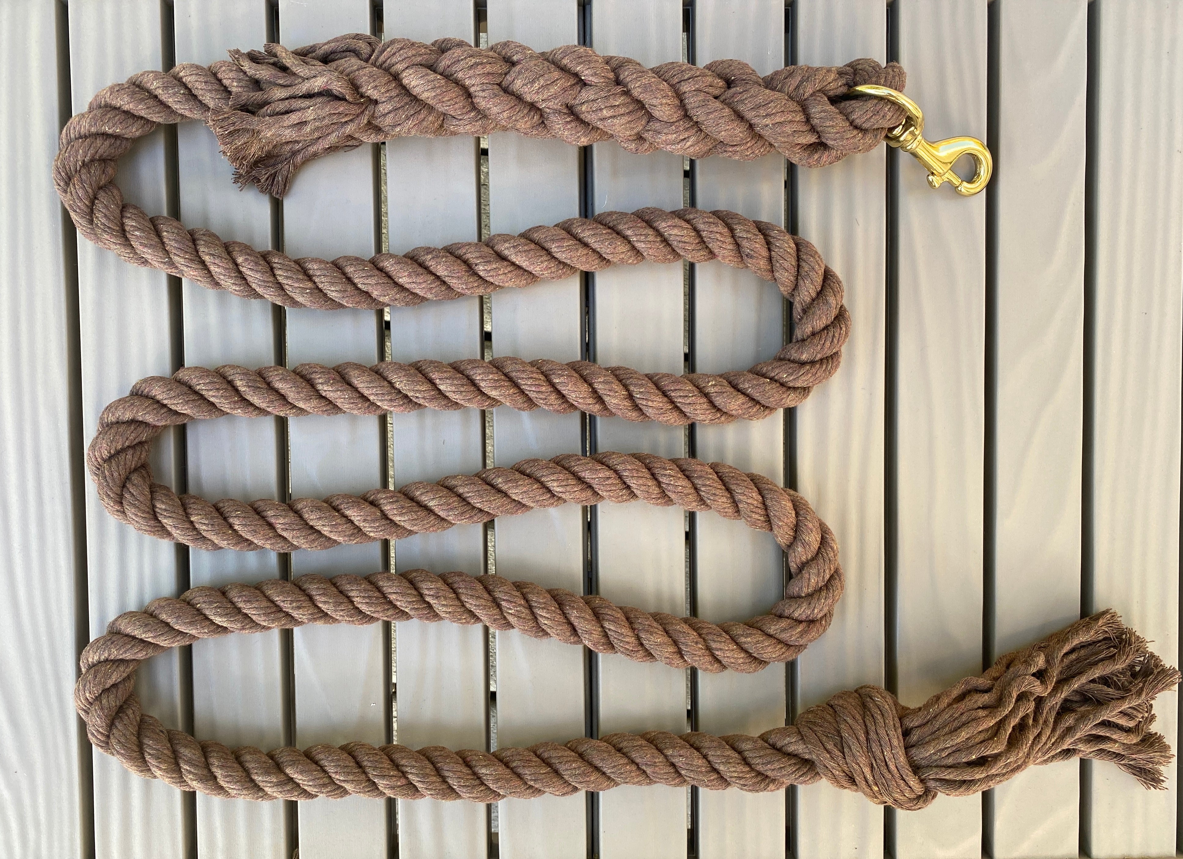 Ravenox Brown Cotton Rope Horse Lead – Extra Large. Crafted in America for durability and softness. UV-resistant, chemical-free, and perfect for extended outdoor use. Secure with robust Brass Swivel Bolt Snaps. Proudly made by a Service-Disabled Veteran-Owned Business. (6479825409)