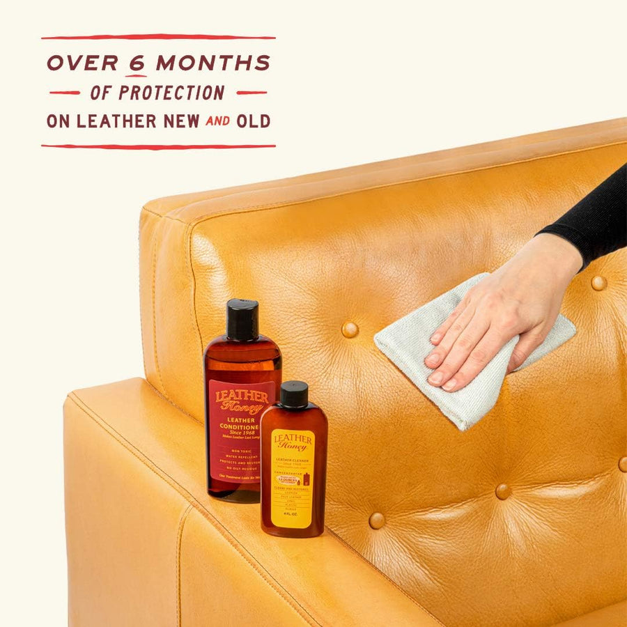 Image of Leather Honey Leather Conditioner applied on a couch, demonstrating its effectiveness in providing 6 months of protection for both new and old leather surfaces. (8287935725805)