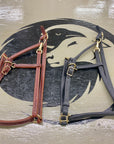 Ravenox Leather Breakaway Horse Halter displayed on Ravenox table, featuring both black and brown variants, emphasizing high-quality latigo leather, traditional Amish hand-stitching, and robust brass accents – epitomizing luxury equestrian style and function. (8233982951661)