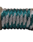 Close-up of a Ravenox hunter green and silver solid braid polypropylene derby rope coiled on a wooden spool. (8217686671597)