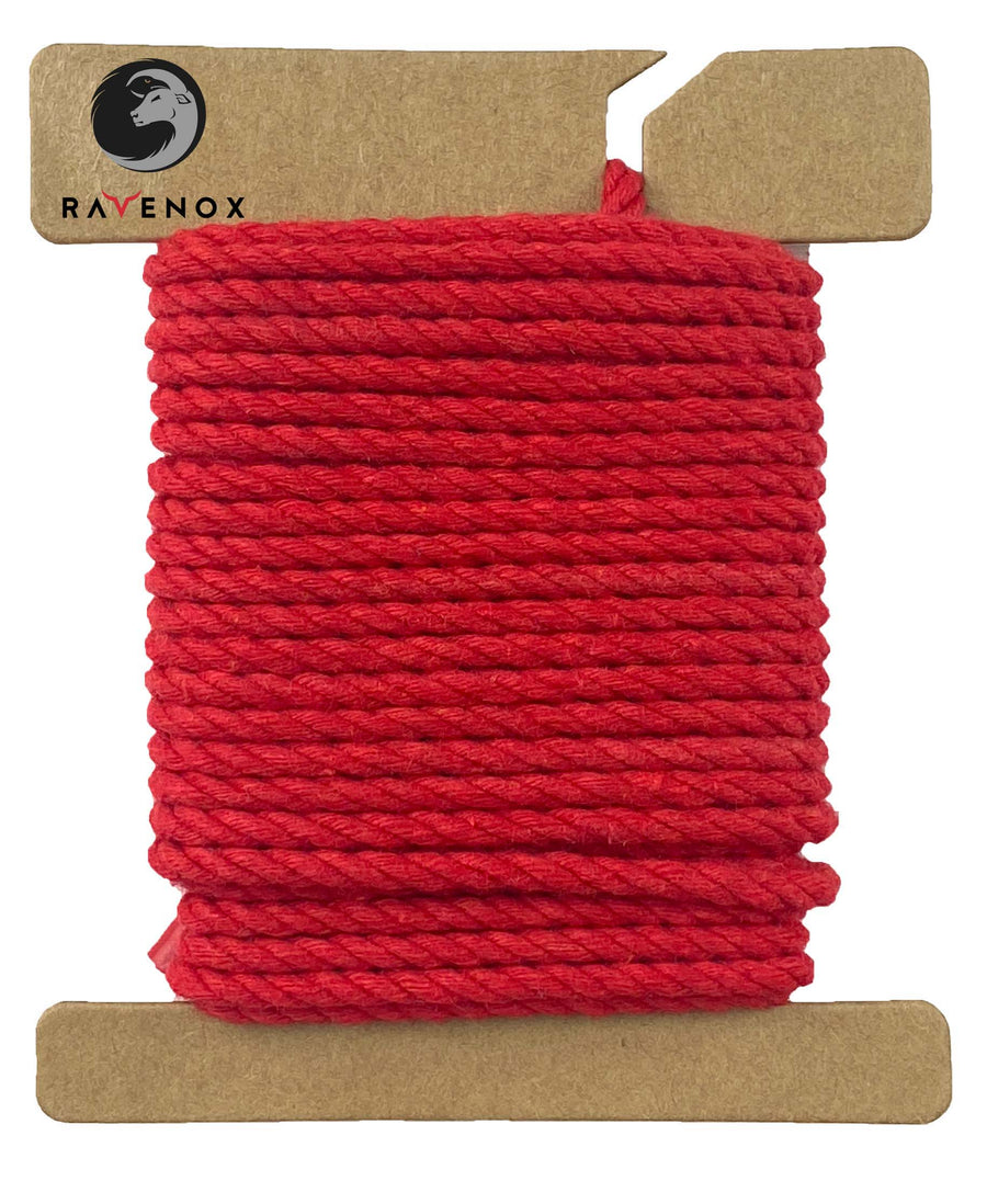 Swatch of Ravenox 2mm & 3mm Three Strand Cotton Macrame Cord in bold Red, coiled on a cardboard disk, emphasizing the cord's vivid color and texture. (7472851976429)