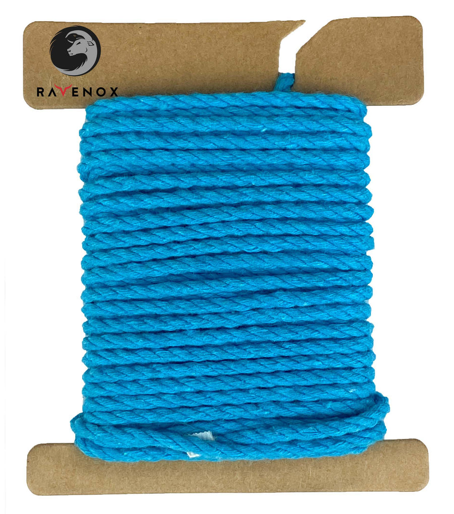 Ravenox 2mm & 3mm Three Strand Cotton Macrame Cord in Turquoise, wrapped on a cardboard disk, displaying the cord’s vivid, jewel-toned color. (7473019486445)