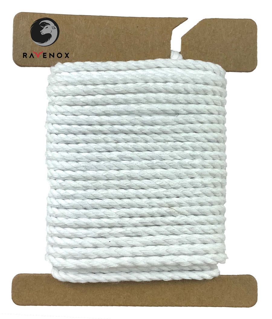 Crisp White Ravenox Three Strand Twisted Polyester Cord, offered in 1/8-inch and 3/16-inch thicknesses, displayed on a cardboard disk showcasing its durability and bright color. (1688301863002)
