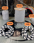 Coils of Ravenox Twisted Cotton Rope in white, black, and multiple sizes, highlighting their versatility for a variety of crafts and DIY projects. (393217081384)