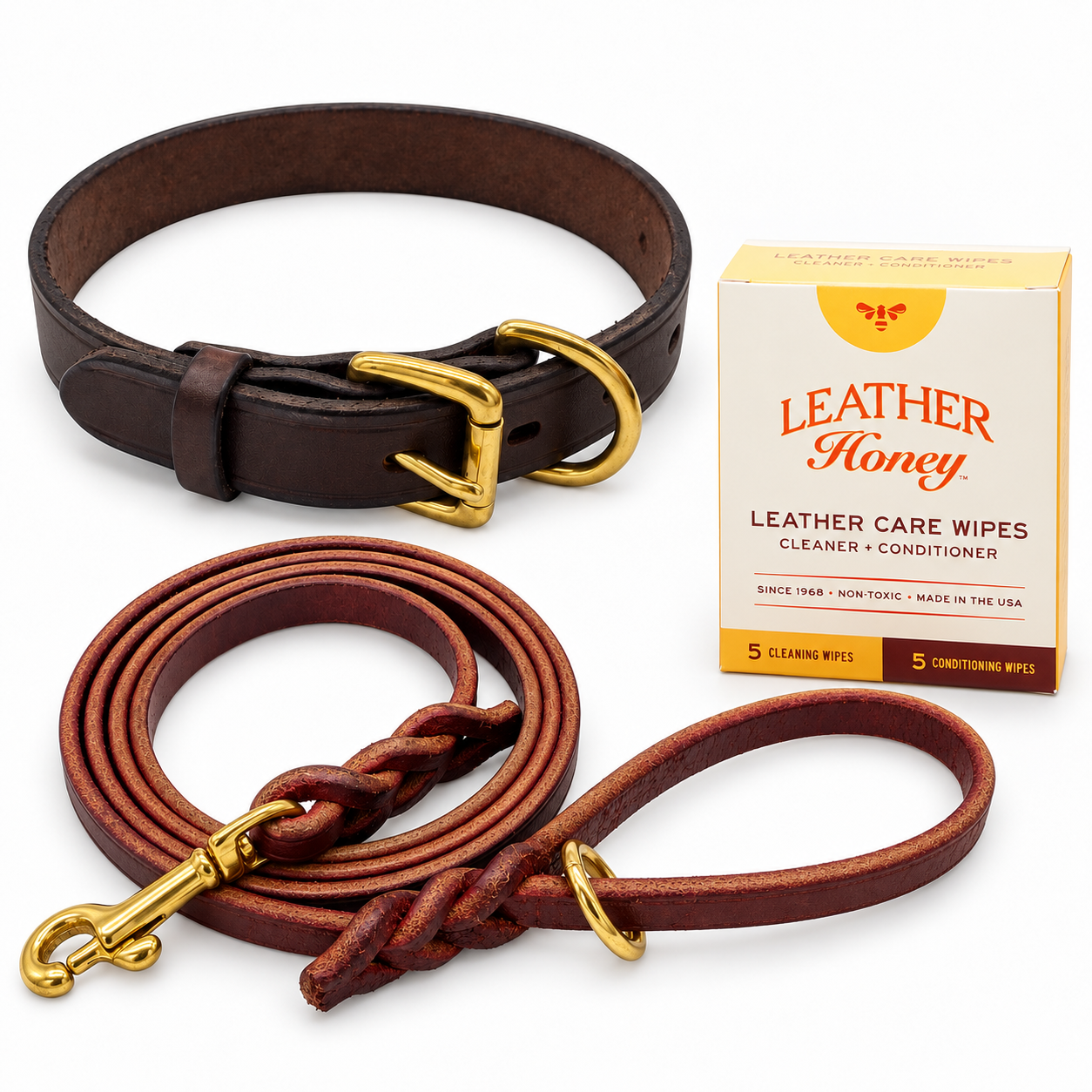 One brown leather dog collar and one burgundy 1/2-inch by 6-foot leash, plus one Leather Honey box containing 5 cleaning and 5 conditioning wipes. Representative Large collar pictured; collar width and hardware details vary by selected size.