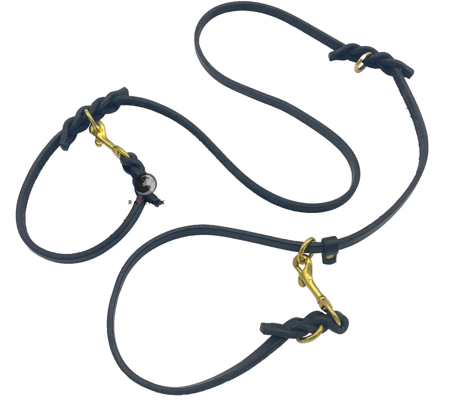 Close-up image of the Ravenox Black Multifunctional Leather Dog Leash with solid brass hardware, showcasing the superior quality and craftsmanship of the Amish-made leash, featuring hand-cutting, edging, and finishing techniques passed down through generations from small, family-owned leather shops. (7838529061101)
