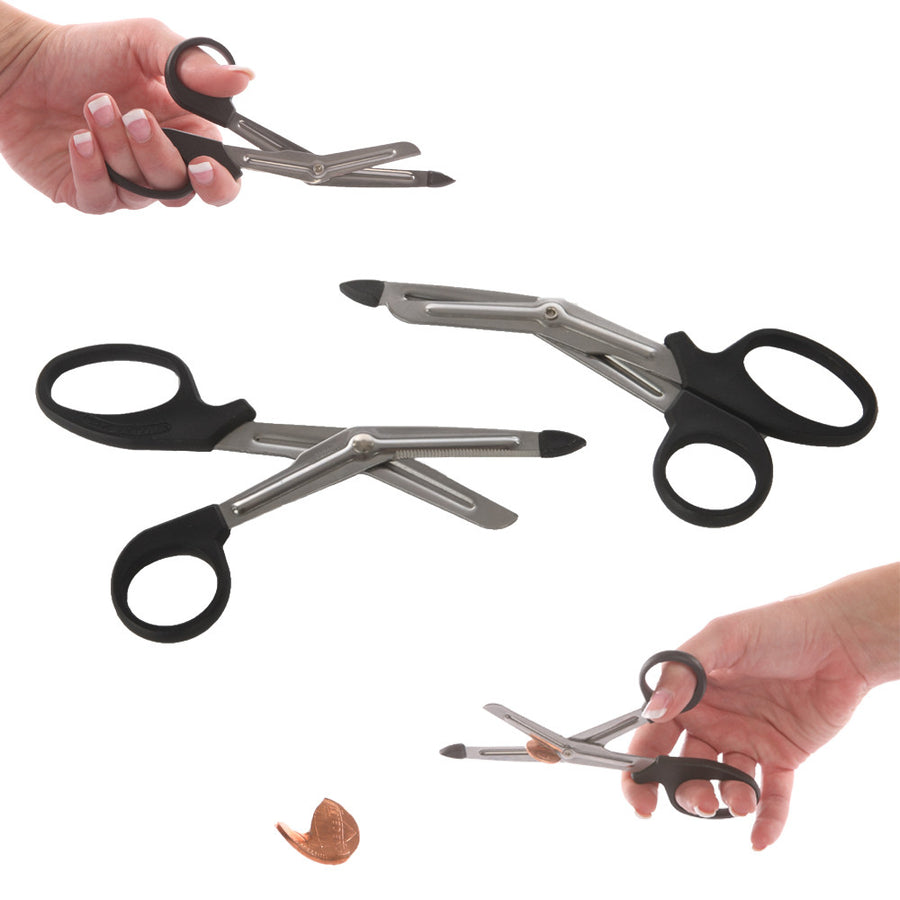 2 pairs of Ravenox EMT Scissors with black handles and a penny that was cut by the scissors.  (4297616705)